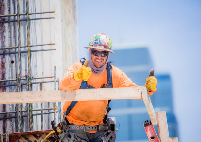 Construction worker on scaffolding.