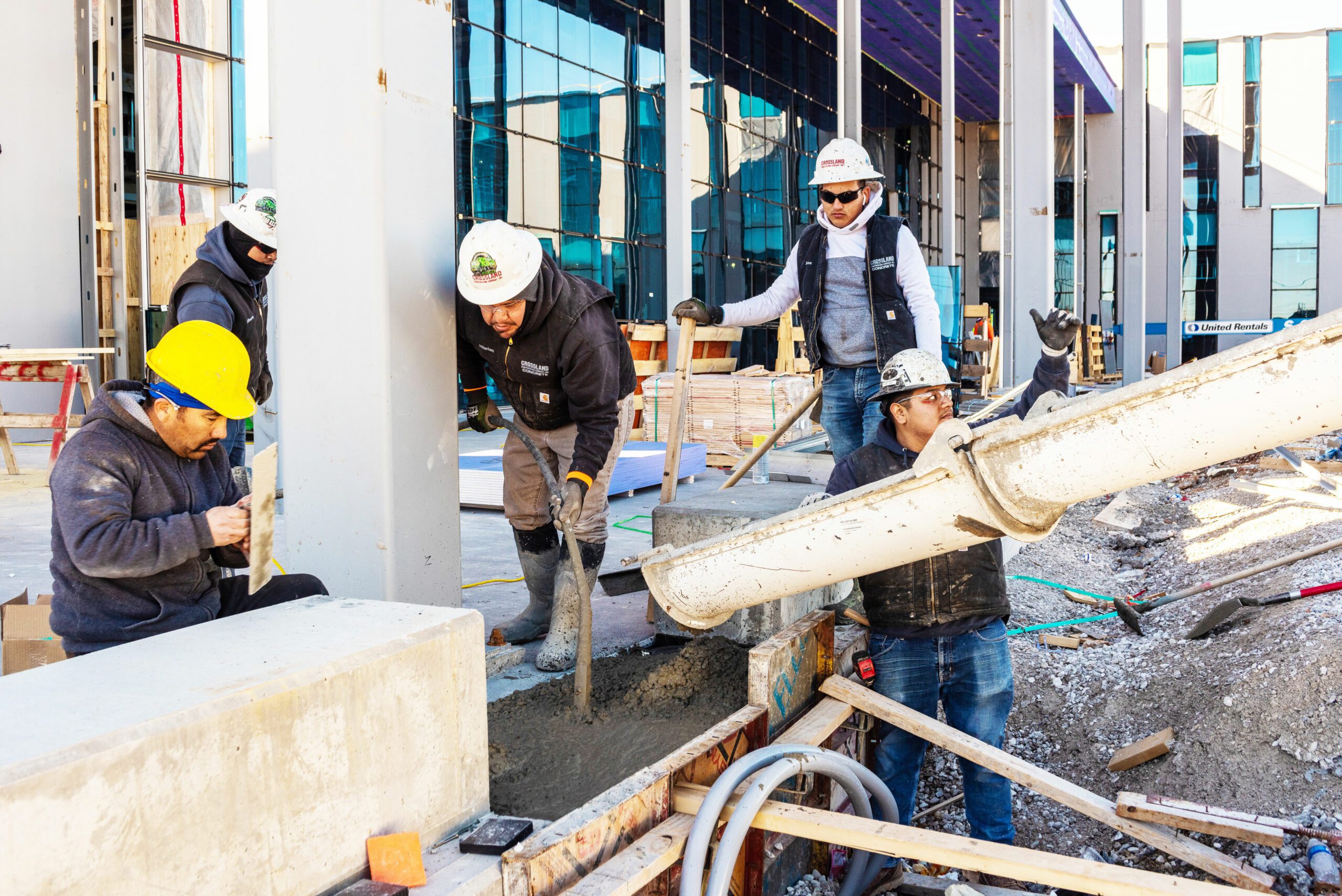 A group of construction workers working on a construction site.