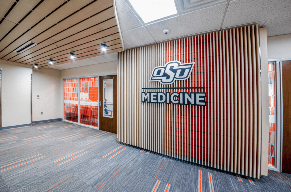 A wall at Oklahoma State University with a sign that says OSU medicine.