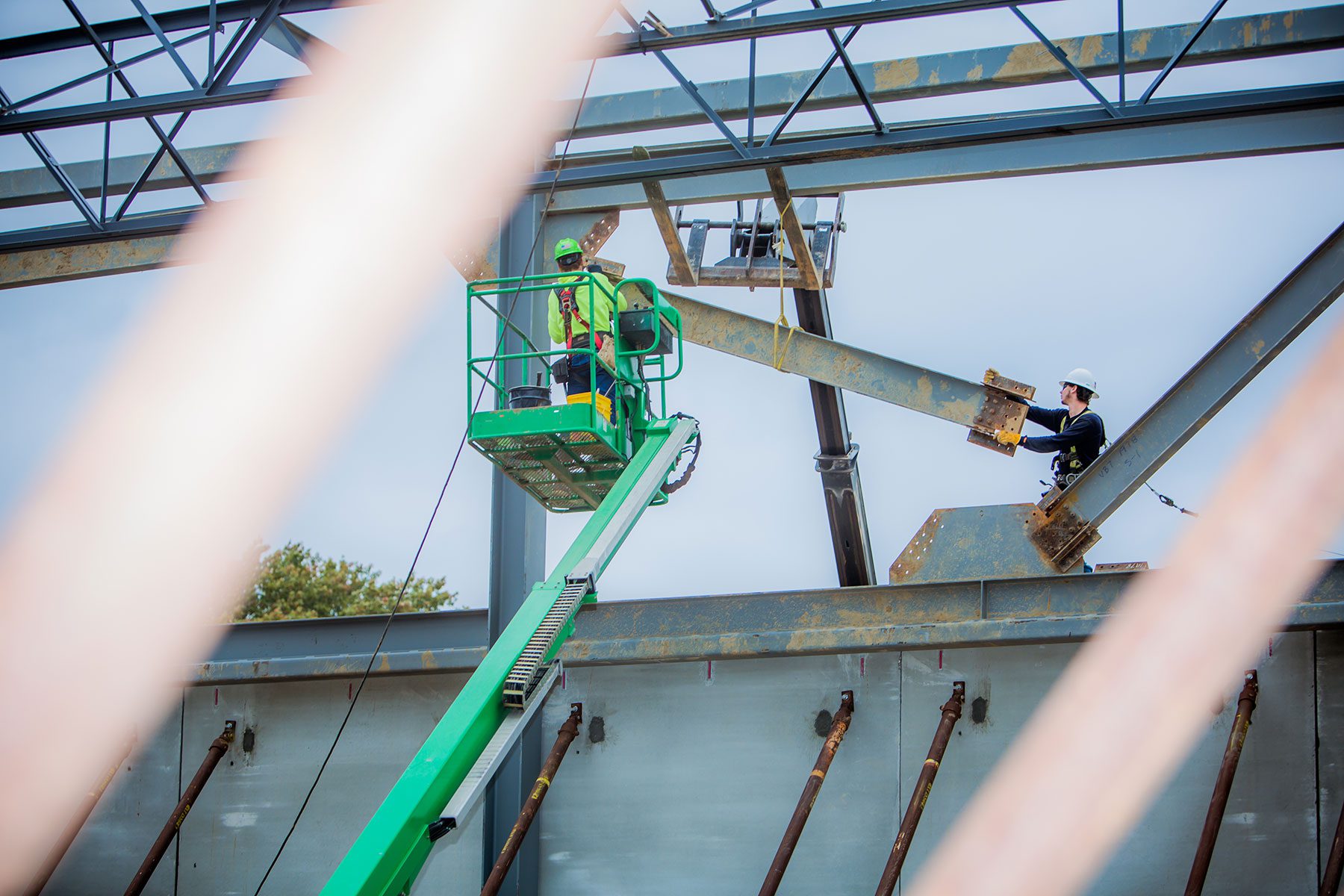 Construction worker on boom lift.