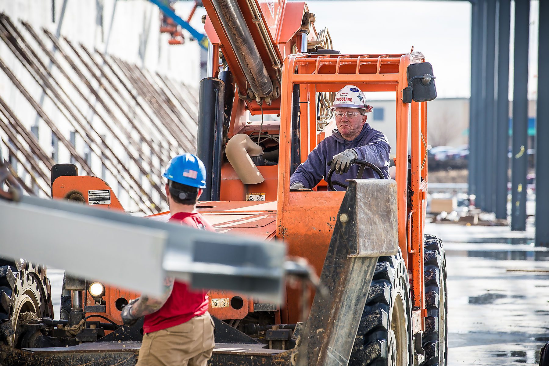 Billy Ellis driving construction machinery.