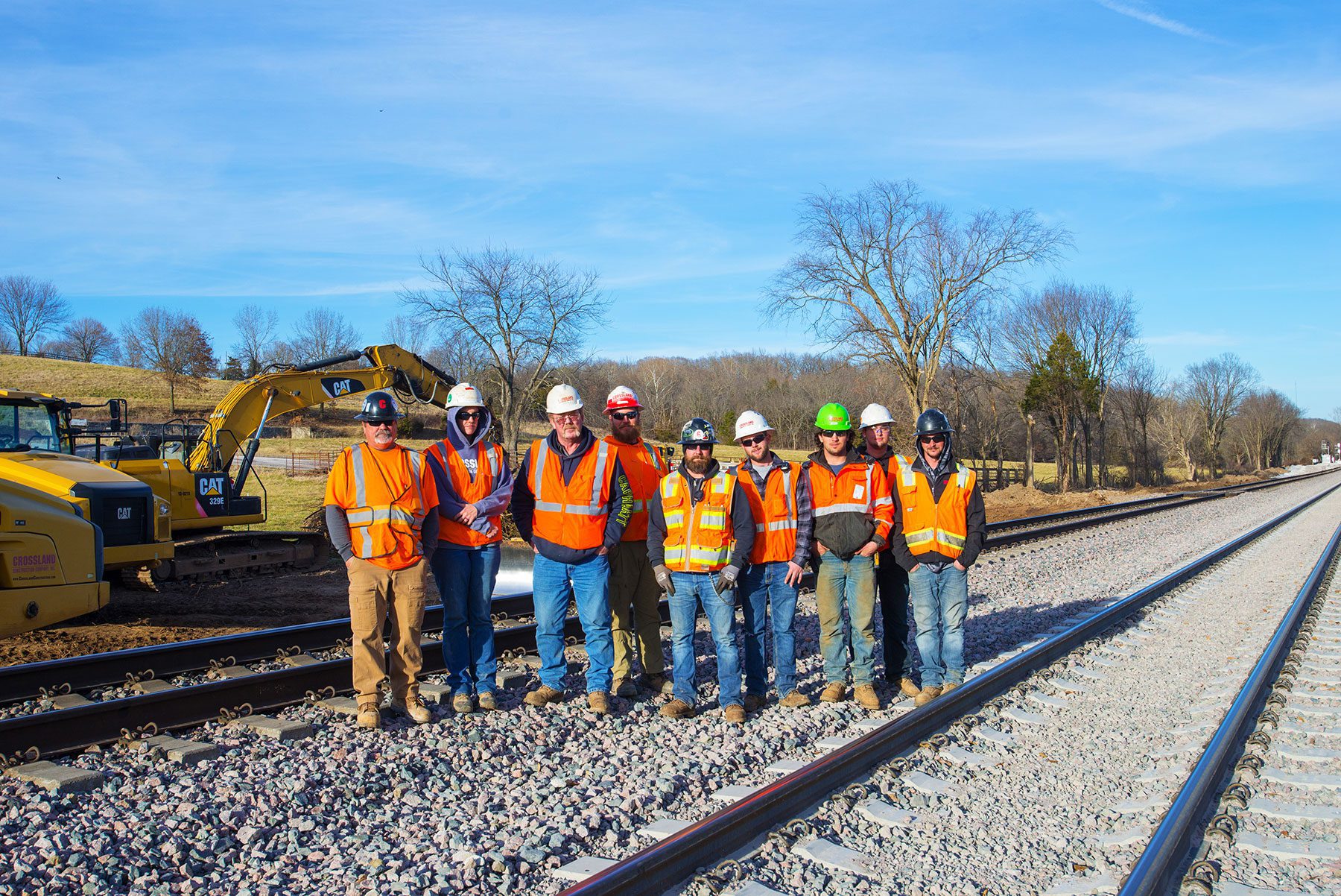 Dirt crew wearing PPE.