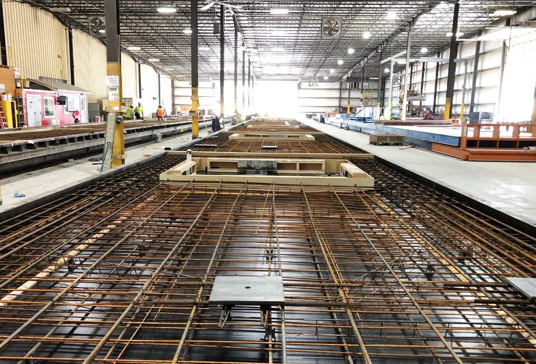 Construction of a steel structure in a factory.