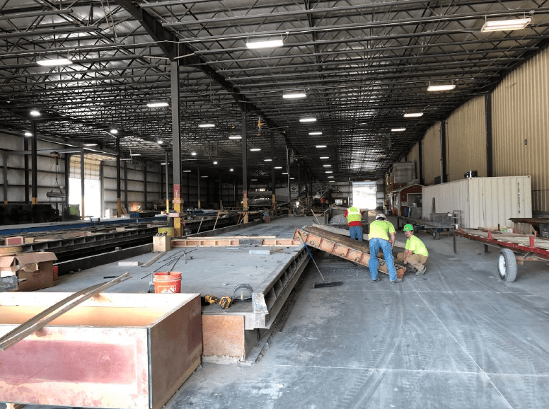 Crossland Prefab workers busy in the warehouse.