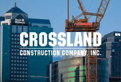 Crossland Construction Company, INC logo with skyscrapers in the background.