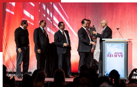 Business man receiving an award.