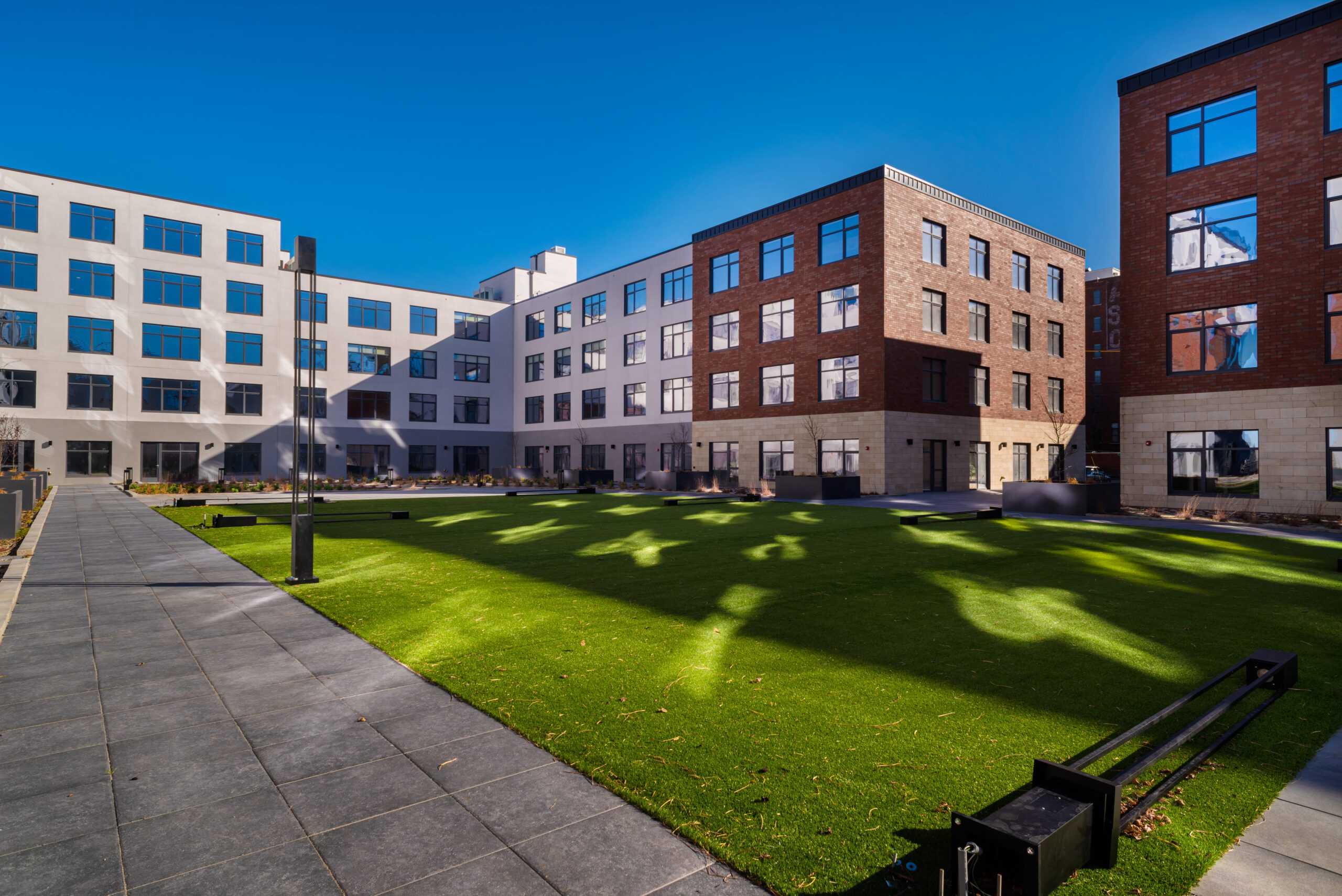 Exterior of Second plus Delaware Apartment buildings.