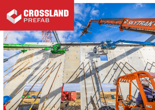 Crossland Prefab with machinery erecting a wall on job site.