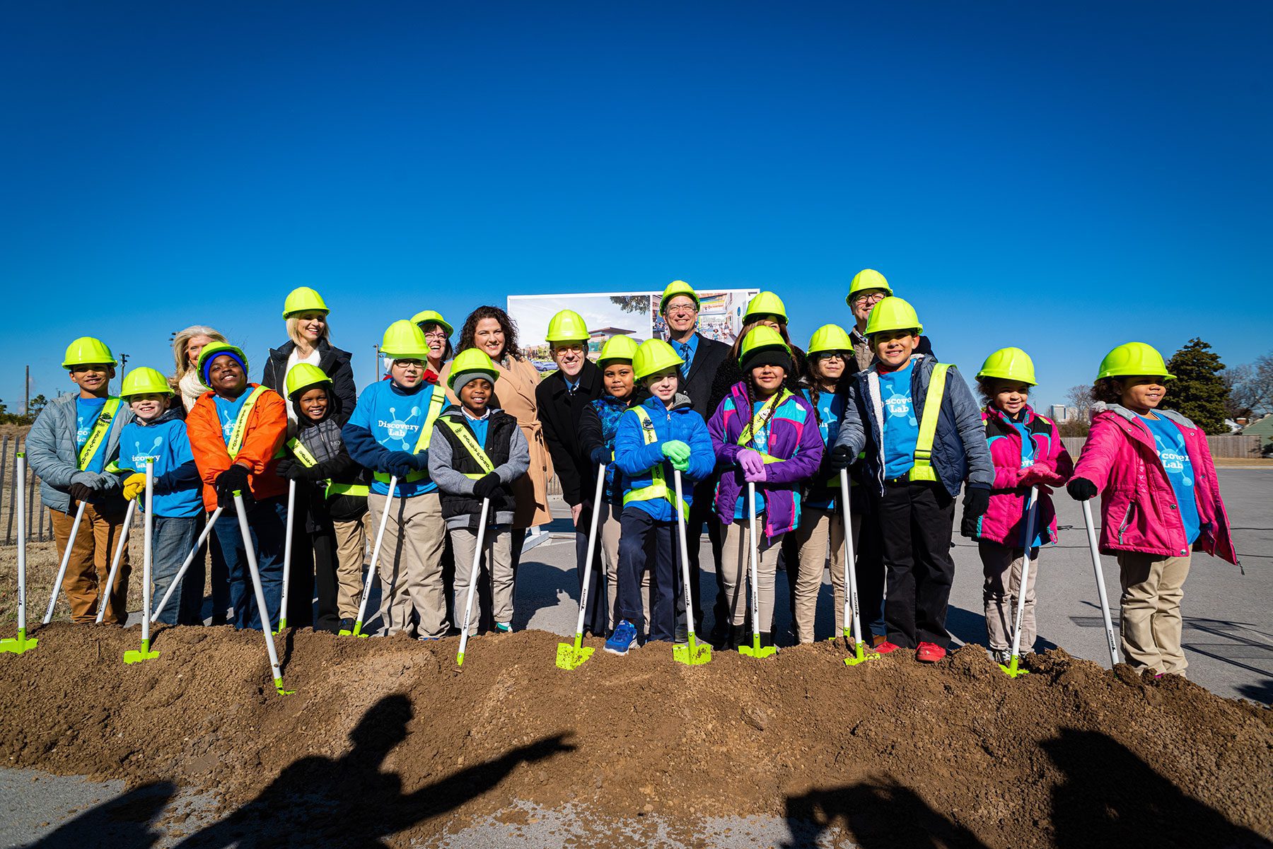 Group of children in PPE who who helped Crossland break ground on the Discovery Lab Children's Museum.